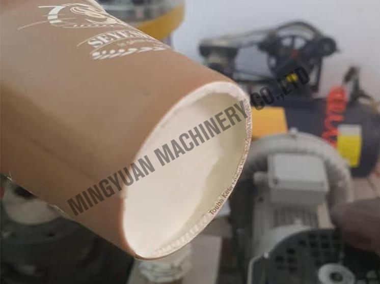 The bottom of the paper cup is unevenly folded