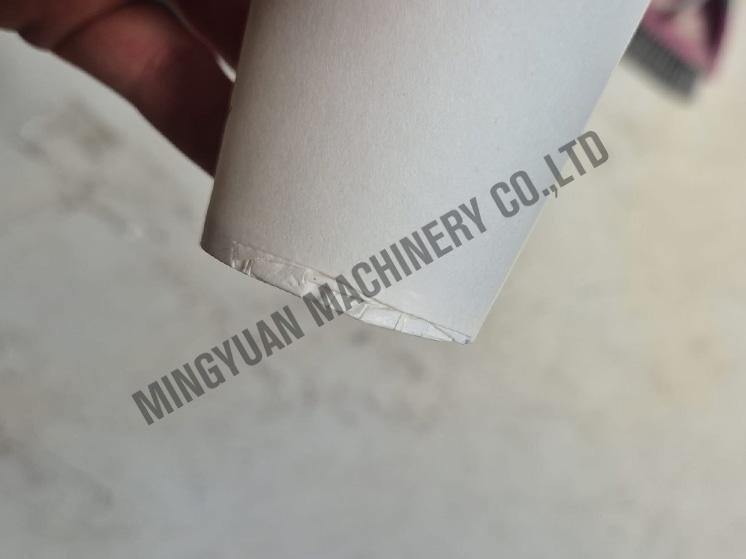 Delayed bottom paper push rod