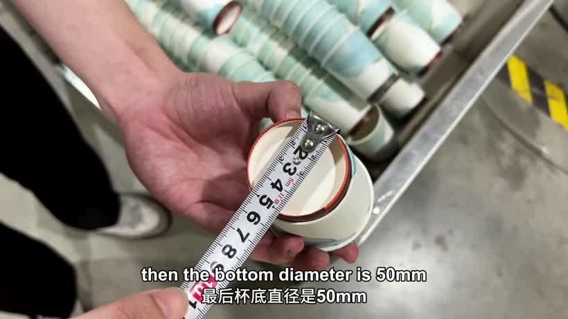 Measuring the 50 mm bottom diameter of the 6 oz double wall paper cup