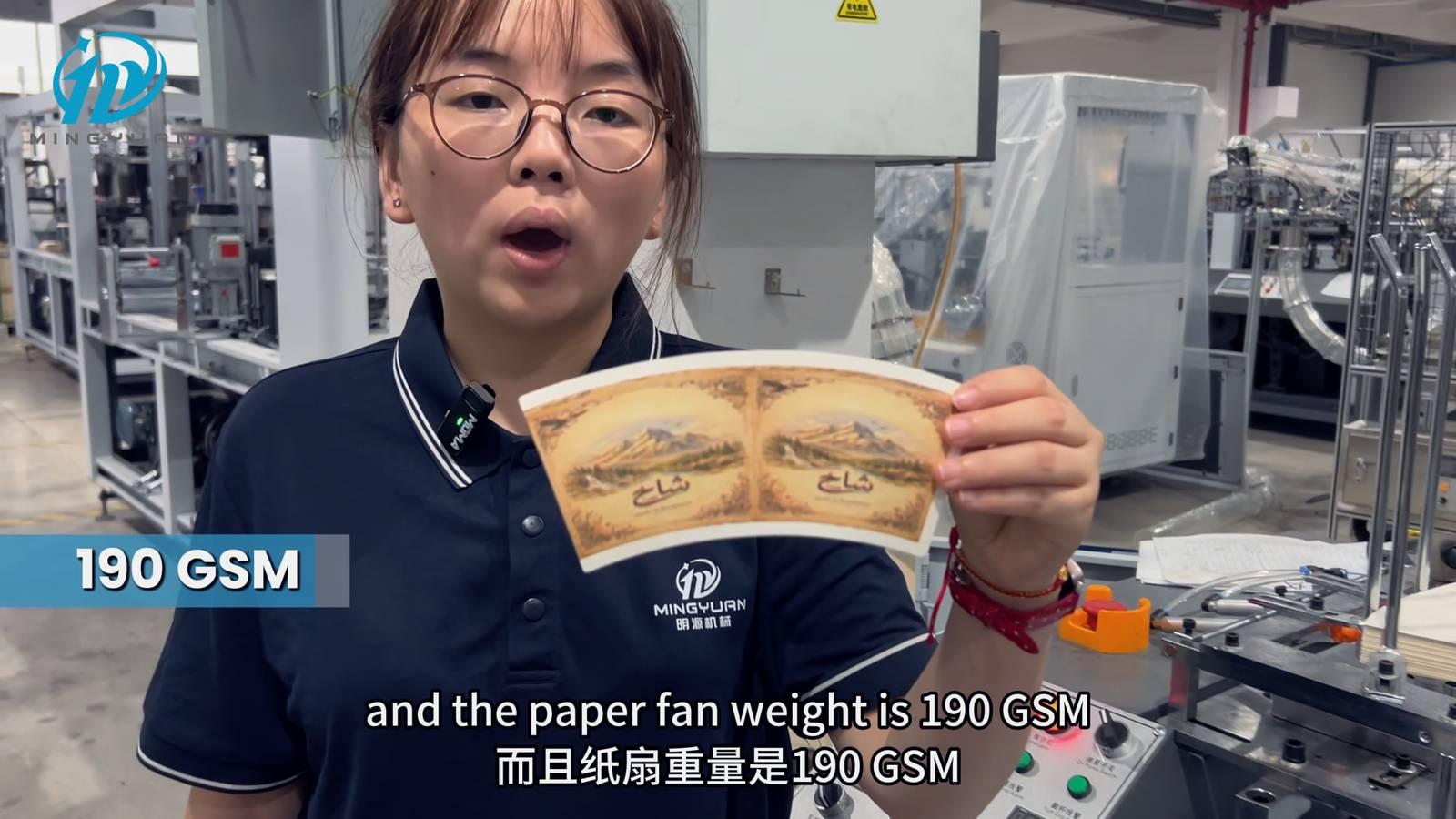 Presenter showing the printed 190 GSM inner-cup paper fan