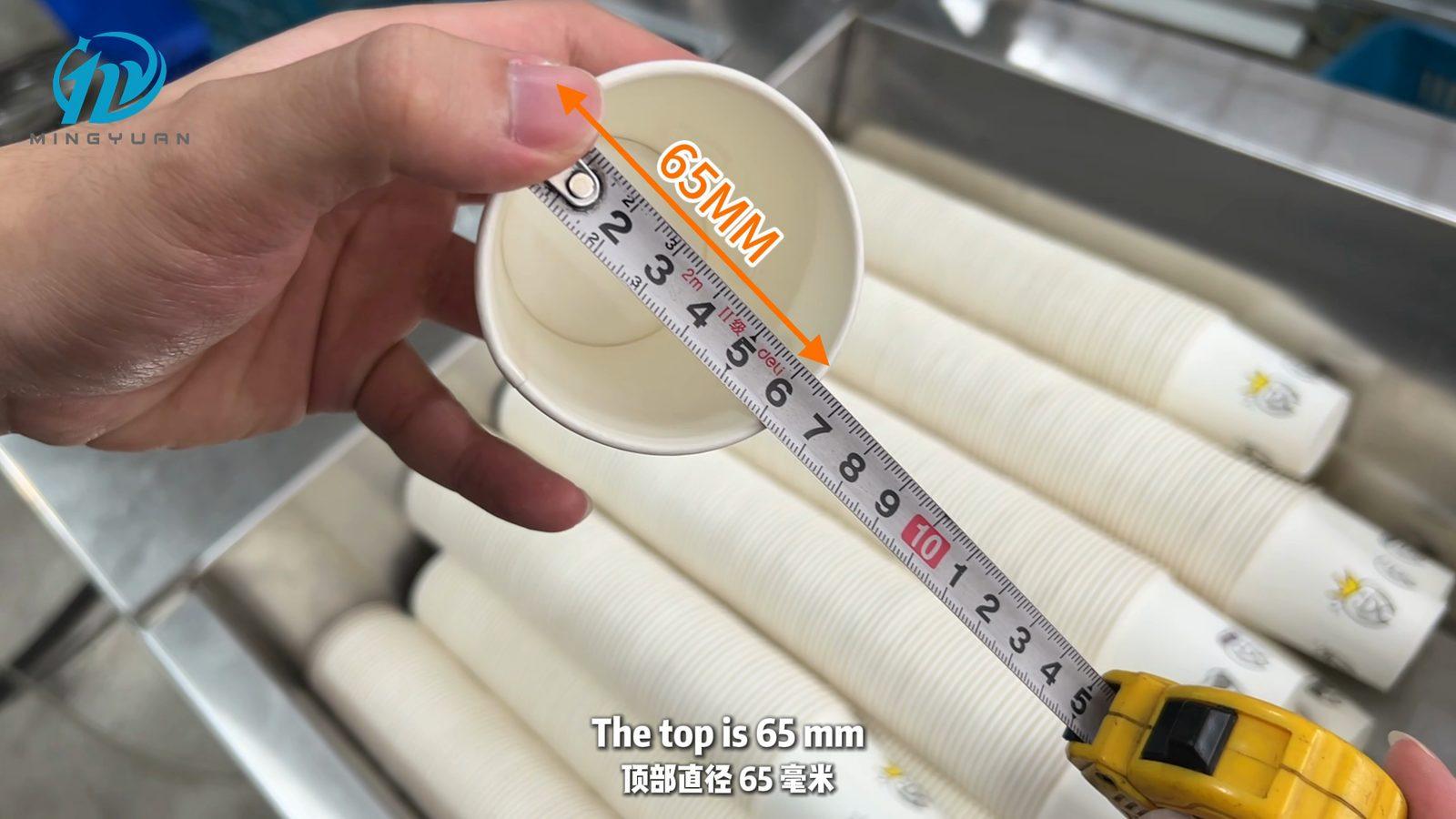 Top diameter of the CN146 sample cup measured at approximately 65 mm