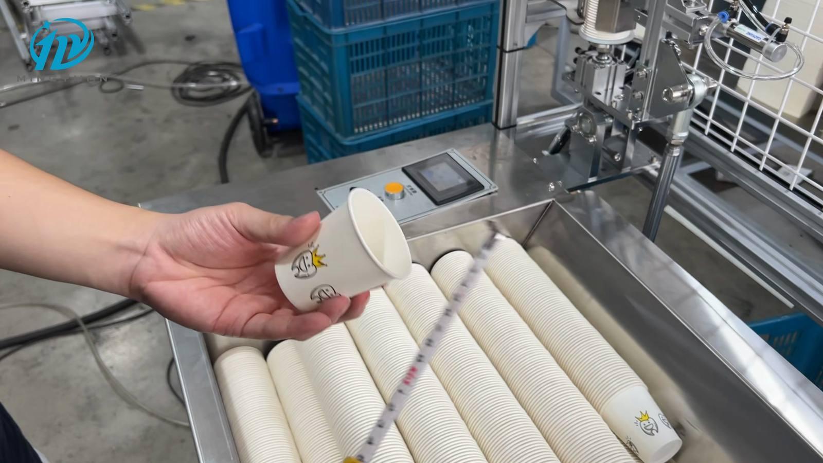 Finished printed cups collected beside the MYC-160SM for sample measurement